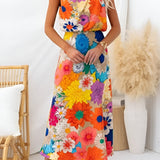 Sommer | Ärmloses Maxikleid mit Bindeband am Hals, taillierter Schnitt, Blumendruck