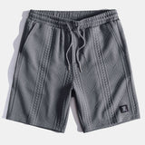 Kurzärmeliges geometrisches Jacquard-T-Shirt mit abgerundetem Saum & Shorts