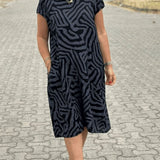 Solina™ – Kleid mit Rundhalsausschnitt und wunderschönem, bauchbedeckendem Print