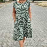 Solina™ – Kleid mit Rundhalsausschnitt und wunderschönem, bauchbedeckendem Print