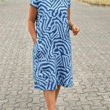 Solina™ – Kleid mit Rundhalsausschnitt und wunderschönem, bauchbedeckendem Print