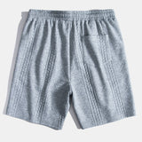 Kurzärmeliges geometrisches Jacquard-T-Shirt mit abgerundetem Saum & Shorts