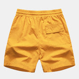Hemd mit Palmenmuster und Shorts zum Schwimmen