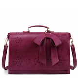 Monikas's elegante Schleifen-Tasche