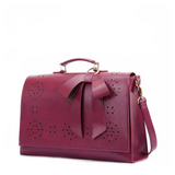 Monikas's elegante Schleifen-Tasche